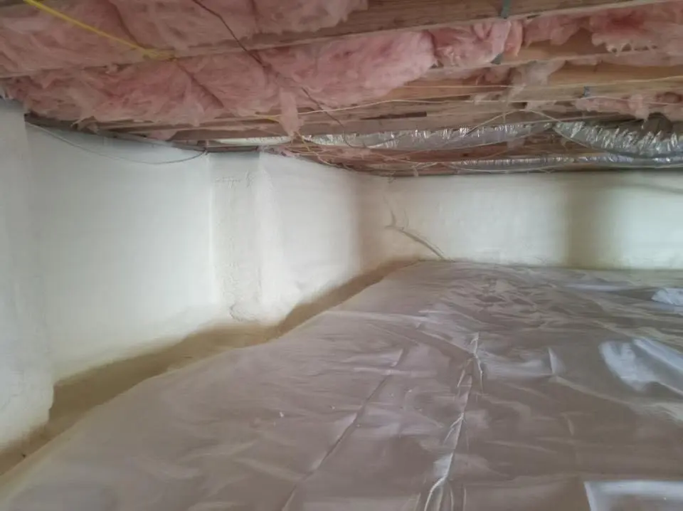 Crawl space encapsulation with closed-cell spray foam for Commercial Roof Restoration in Thomaston